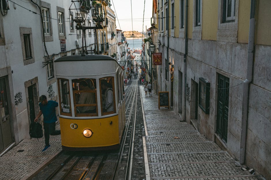 Alfama narrow street morning tram
